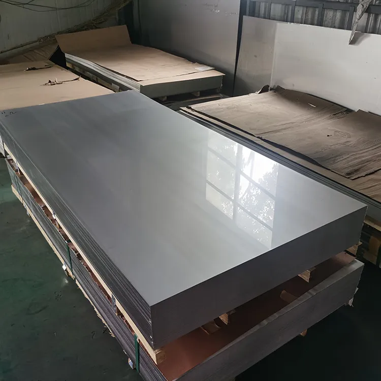 Stacked polished 316L stainless steel plate in a processing warehouse
